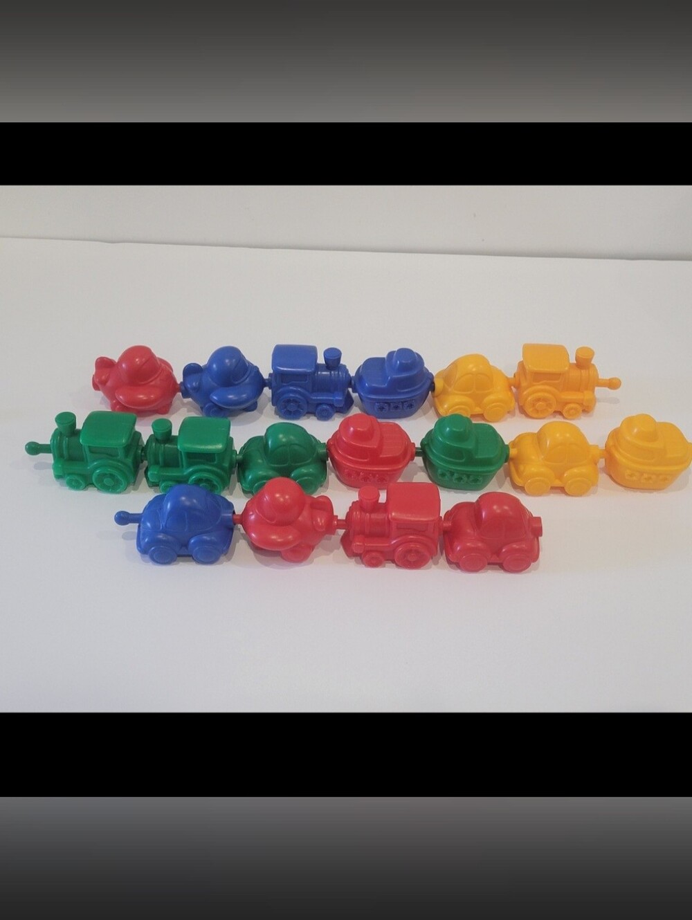 Colorful Interlocking Toy Train Cars - Red, Blue, Green, Yellow